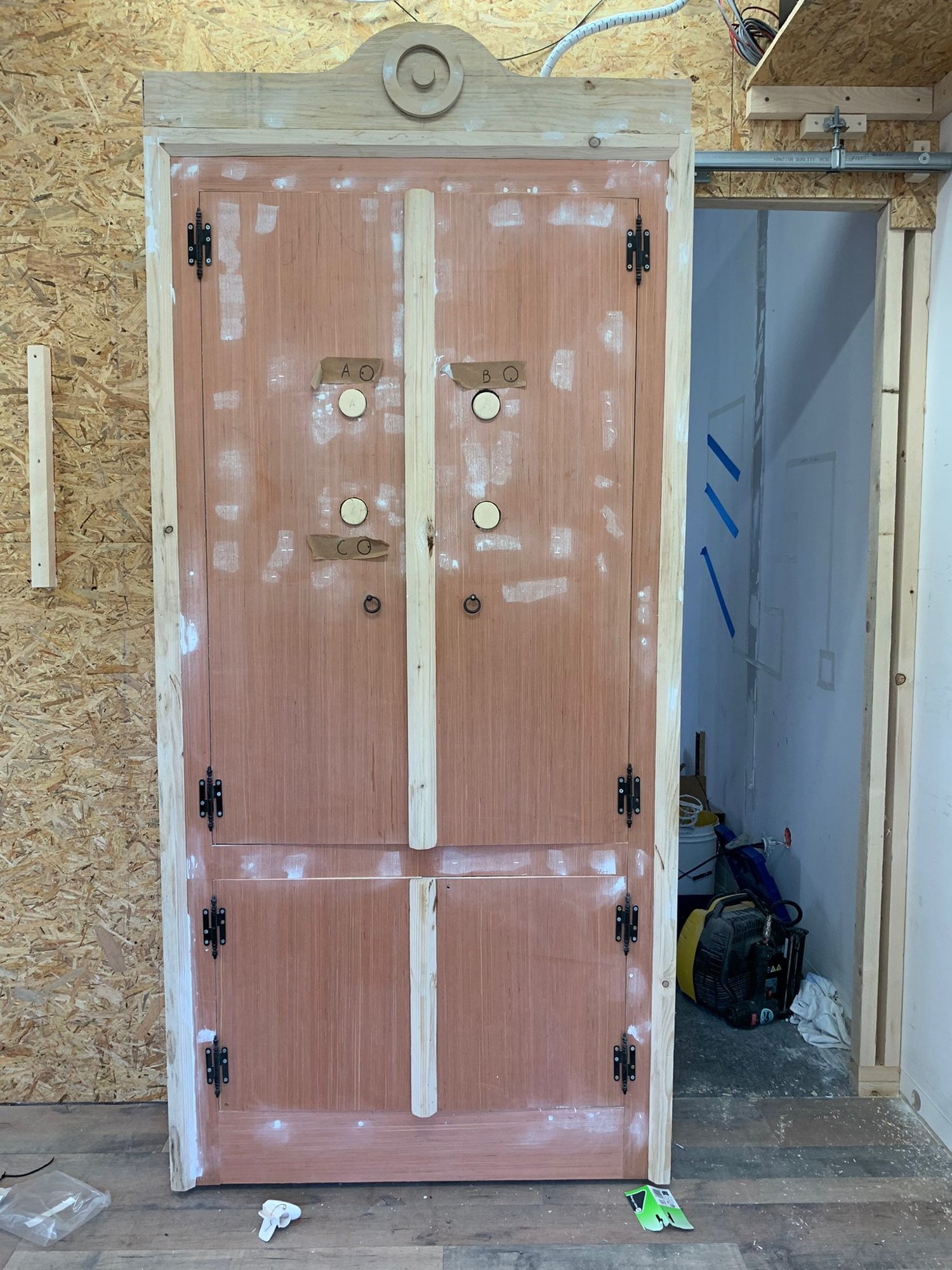 The multi-lock door, primed before ageing