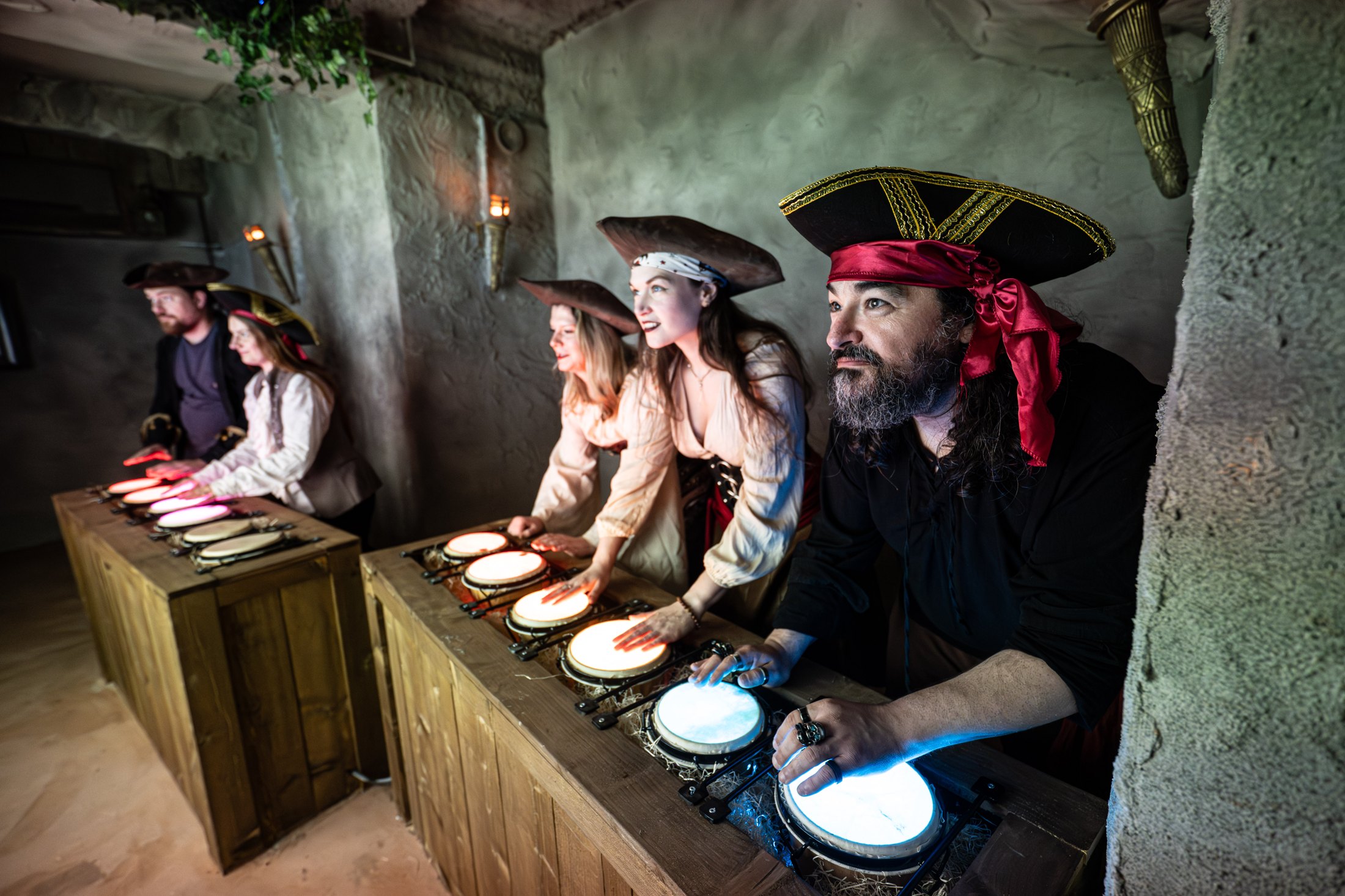 Players behind the grille of the treasure room